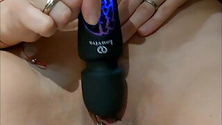 Beautiful MILF jerks off until she cums with her magic wand